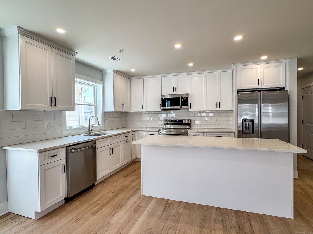 Interior, Kitchen, Recessed Lighting, Stainless Steel Appliances, Wood Texture Flooring