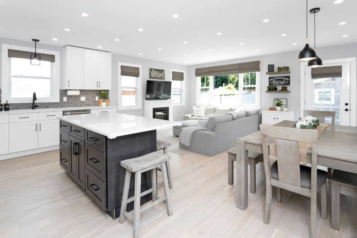 Dining room, Fireplace, Interior, Kitchen, Living room, Pendant Lights, Recessed Lighting, Wood Texture Flooring