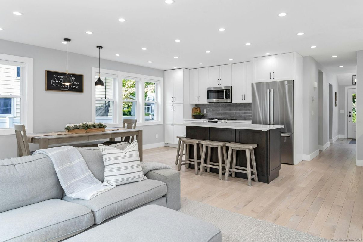 Dining room, Interior, Kitchen, Pendant Lights, Recessed Lighting, Stainless Steel Appliances, Wood Texture Flooring