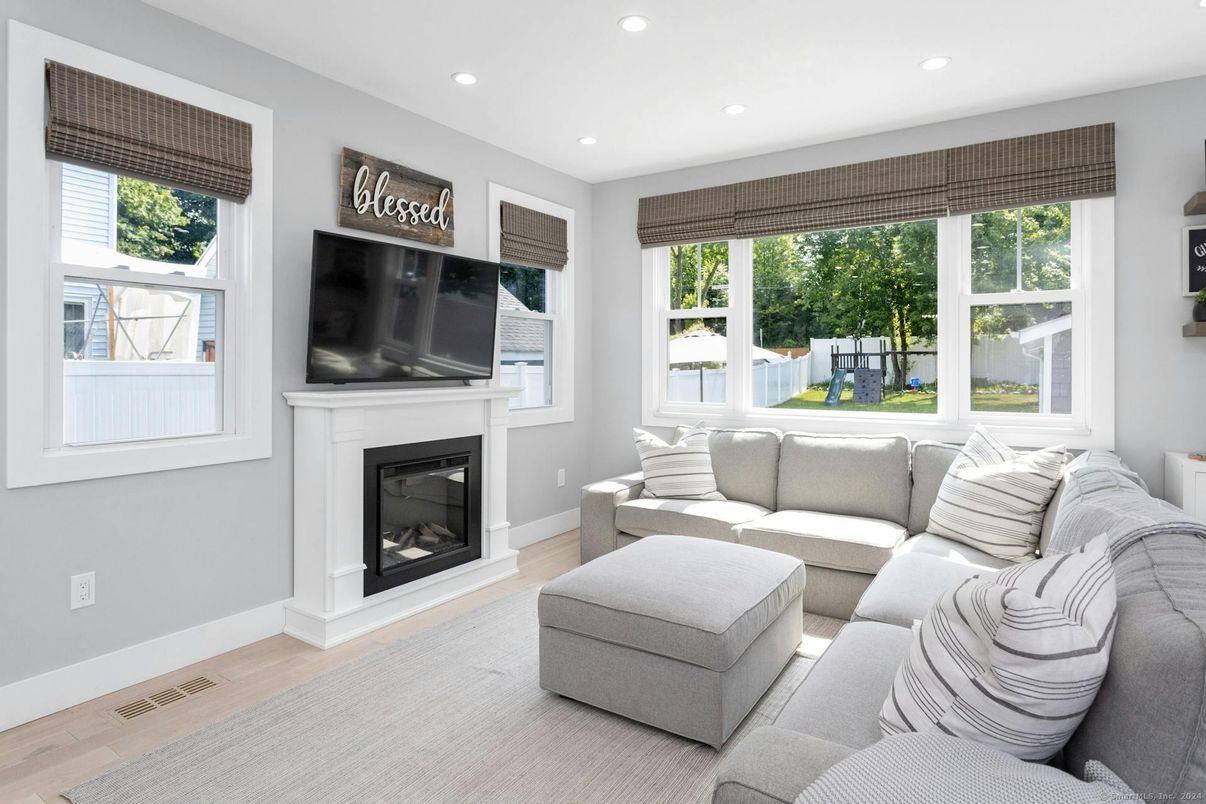 Fireplace, Interior, Living room, Recessed Lighting, Wood Texture Flooring