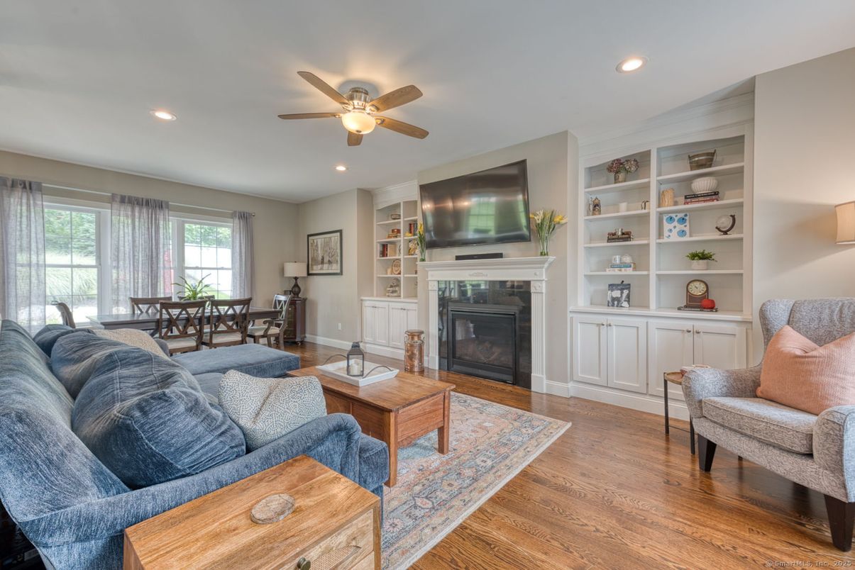 Dining room, Fireplace, Interior, Living room, Recessed Lighting, Wood Texture Flooring