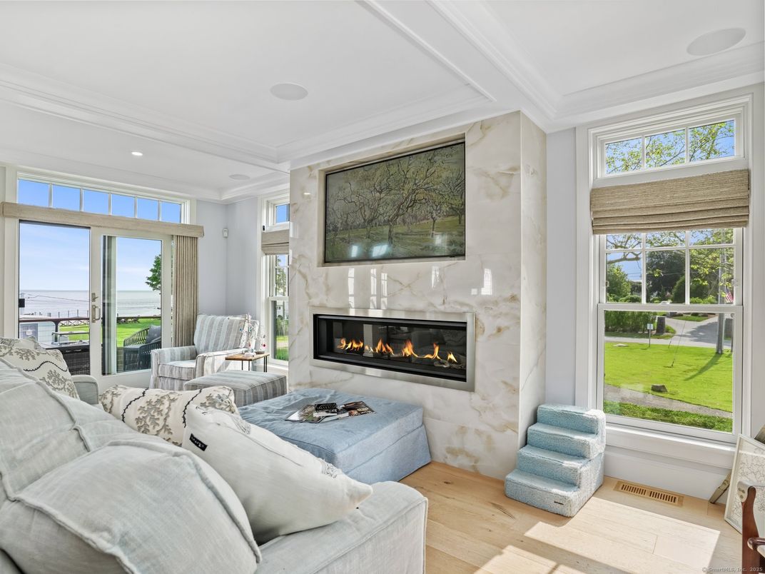 Fireplace, Interior, Living room, Recessed Lighting, Water, Wood Texture Flooring