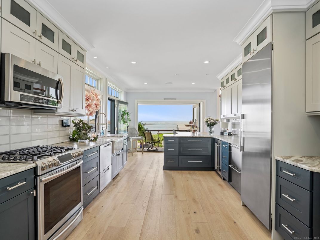 Interior, Kitchen, Recessed Lighting, Stainless Steel Appliances, Water, Wood Texture Flooring
