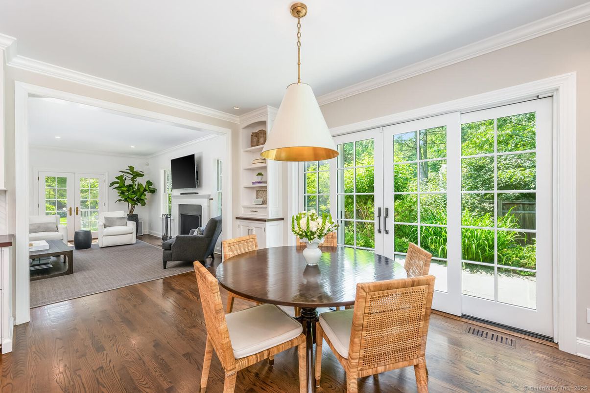 Dining room, Fireplace, Interior, Living room, Pendant Lights, Recessed Lighting, Wood Texture Flooring