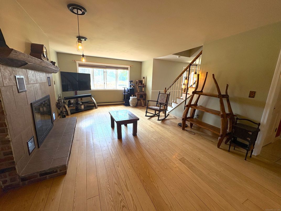 Fireplace, Interior, Pendant Lights, Wood Texture Flooring