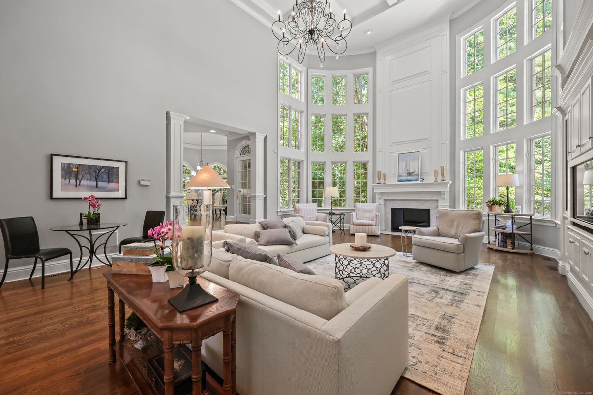 Chandelier, Dining room, Fireplace, Interior, Living room, Recessed Lighting, Wood Texture Flooring