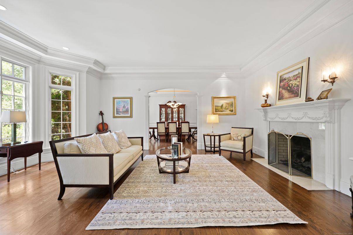 Chandelier, Dining room, Fireplace, Interior, Living room, Recessed Lighting, Wood Texture Flooring