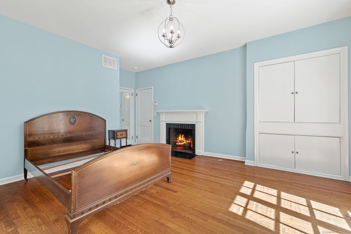 Bedroom, Fireplace, Interior, Pendant Lights, Wood Texture Flooring