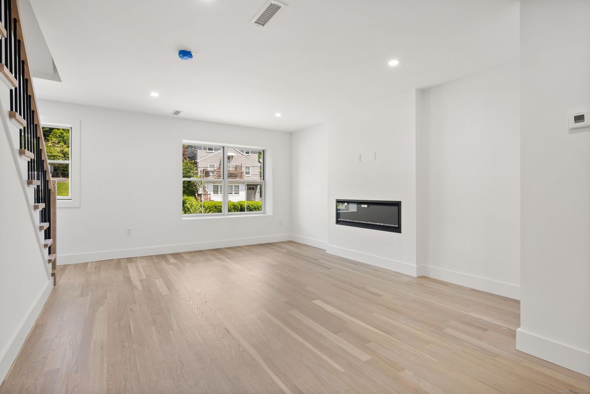 Empty room, Fireplace, Interior, Recessed Lighting, Wood Texture Flooring