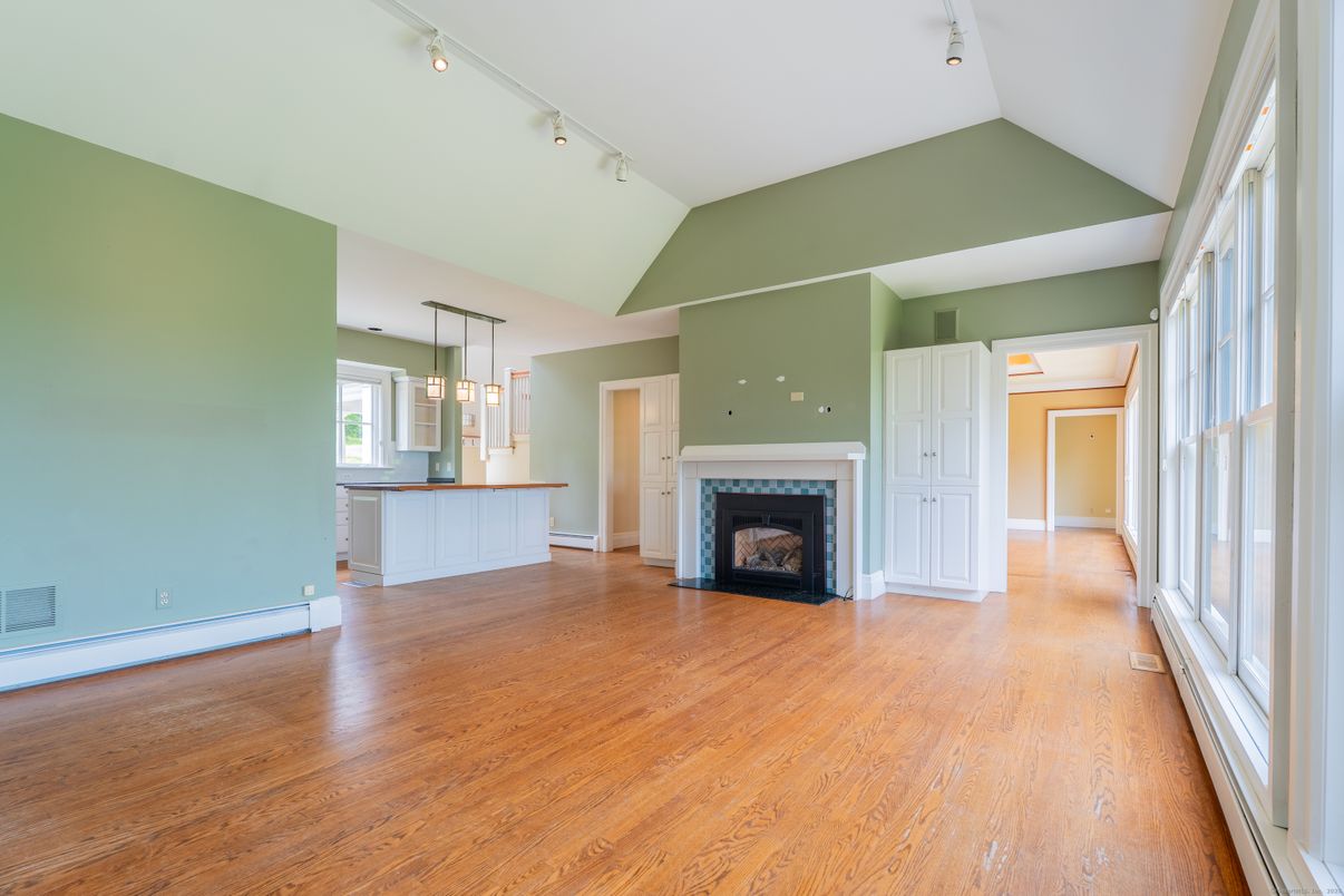 Empty room, Fireplace, Interior, Pendant Lights, Wood Texture Flooring