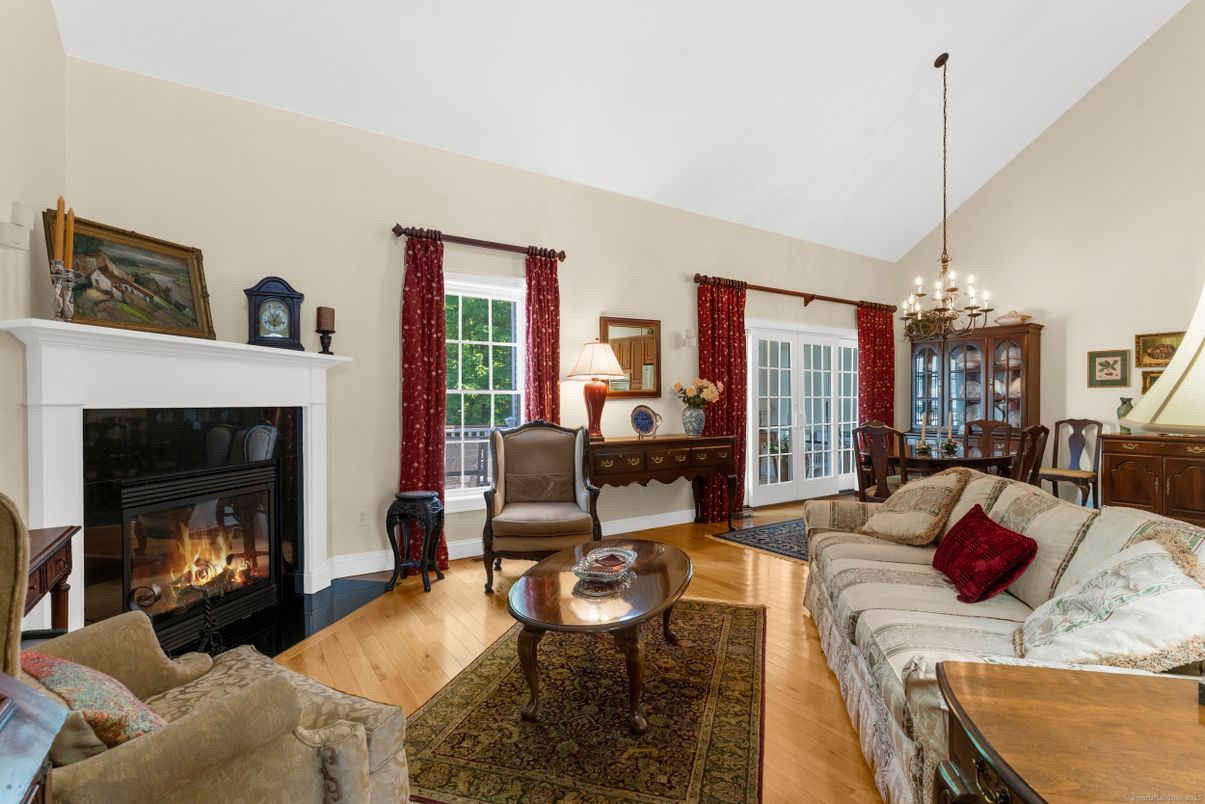 Chandelier, Dining room, Fireplace, Interior, Living room, Pendant Lights, Wood Texture Flooring