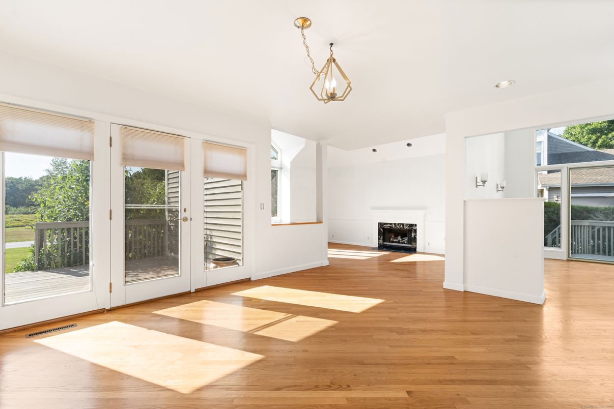 Empty room, Fireplace, Interior, Pendant Lights, Recessed Lighting, Wood Texture Flooring