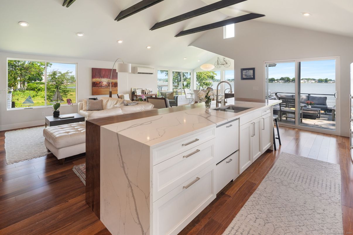 Dining room, Interior, Kitchen, Living room, Pendant Lights, Recessed Lighting, Water, Wooden Beams, Wood Texture Flooring