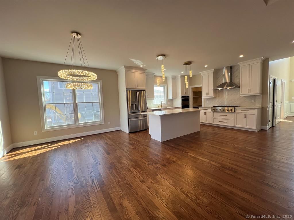 Chandelier, Interior, Kitchen, Pendant Lights, Recessed Lighting, Stainless Steel Appliances, Wood Texture Flooring