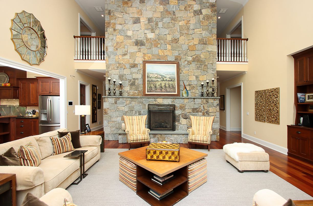 Fireplace, Interior, Kitchen, Living room, Recessed Lighting, Stainless Steel Appliances, Stone Walls, Wood Texture Flooring