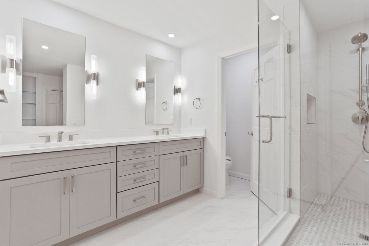 Bathroom, Dual Sink Vanities, Glass Shower, Interior, Marble, Recessed Lighting