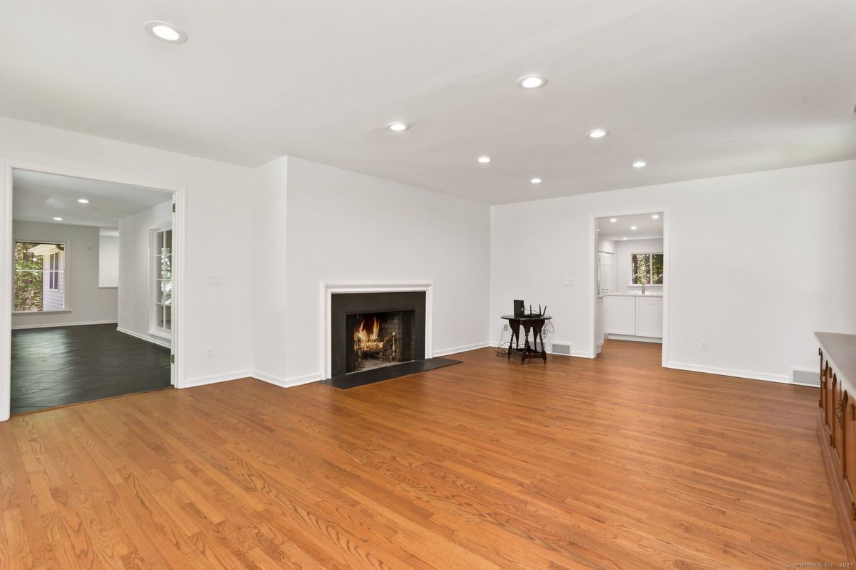 Empty room, Fireplace, Interior, Recessed Lighting, Wood Texture Flooring