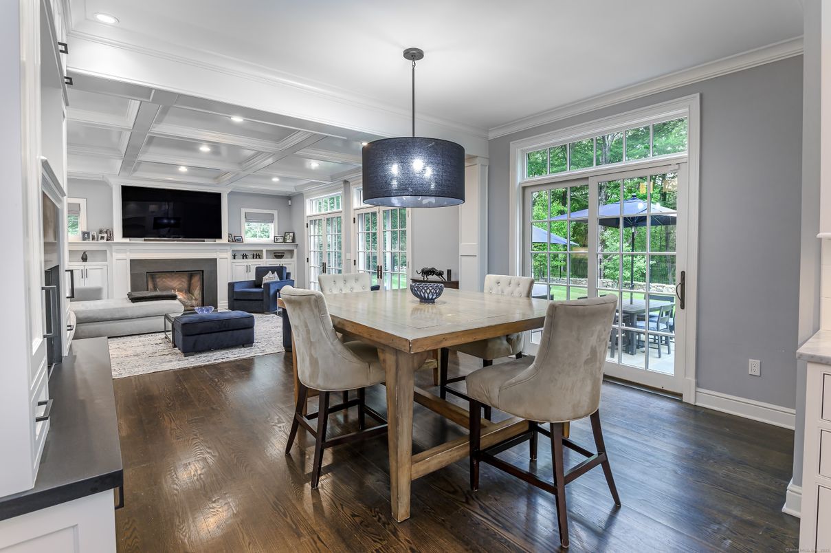 Dining room, Fireplace, Interior, Living room, Pendant Lights, Recessed Lighting, Wood Texture Flooring