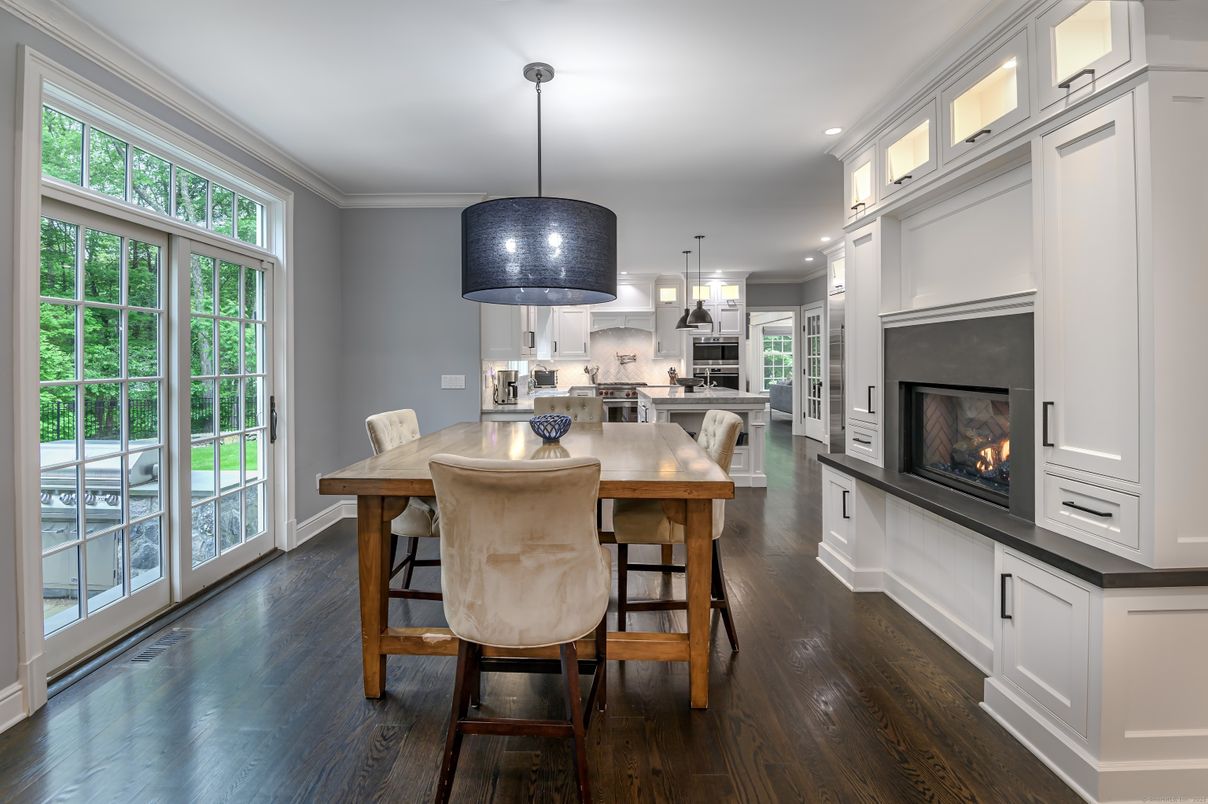 Dining room, Fireplace, Interior, Kitchen, Pendant Lights, Recessed Lighting, Wood Texture Flooring