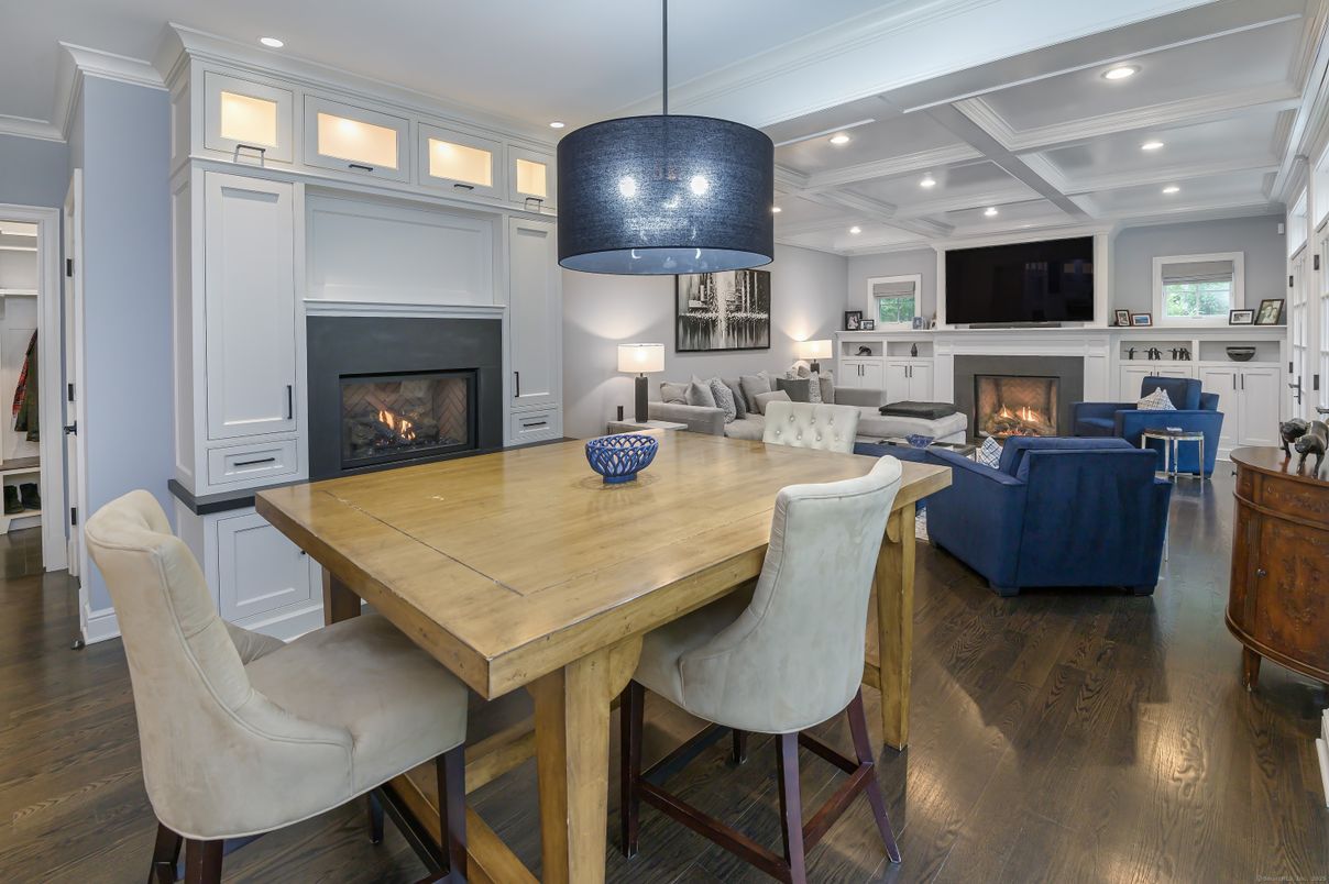 Dining room, Fireplace, Interior, Living room, Pendant Lights, Recessed Lighting, Wood Texture Flooring