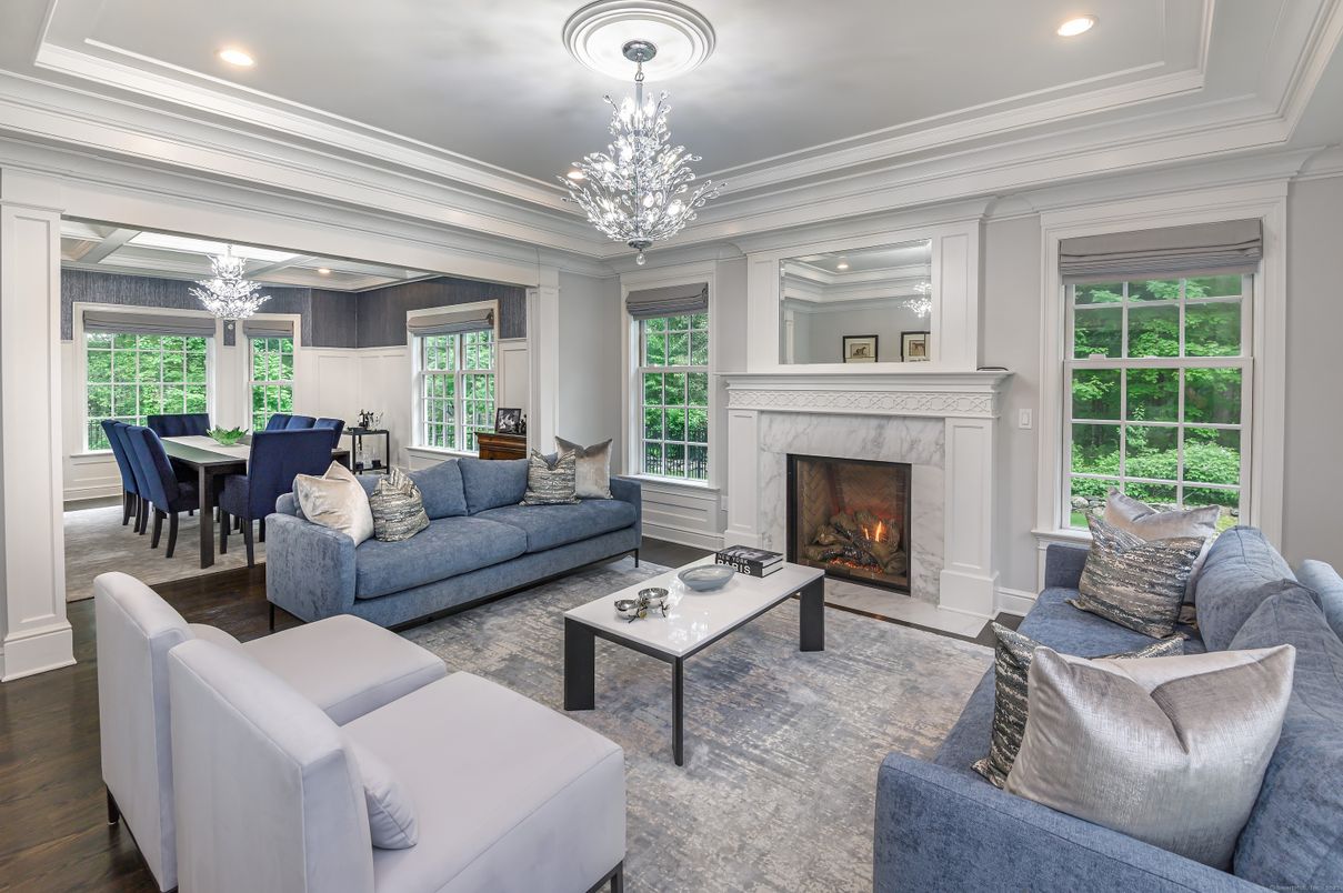 Chandelier, Dining room, Fireplace, Interior, Living room, Recessed Lighting, Wood Texture Flooring