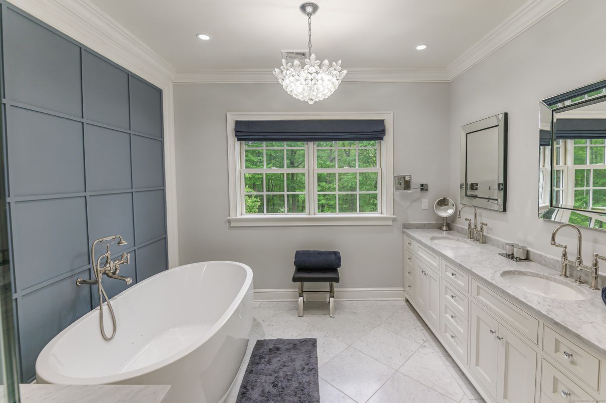 Bathroom, Chandelier, Dual Sink Vanities, Free Standing Baths, Interior, Recessed Lighting