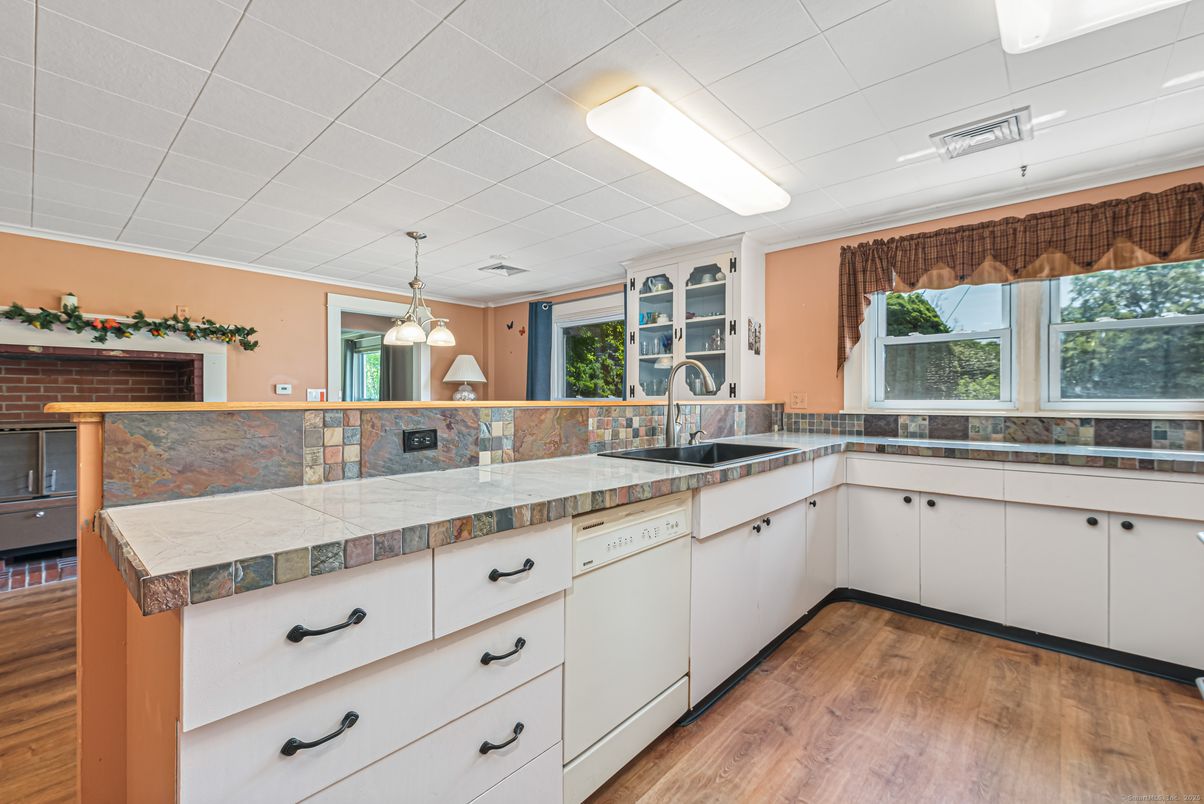 Interior, Kitchen, Pendant Lights, Tile Countertops, Wood Texture Flooring