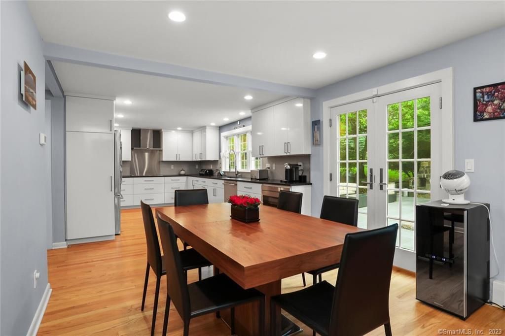 Dining room, Interior, Kitchen, Recessed Lighting, Stainless Steel Appliances, Wood Texture Flooring