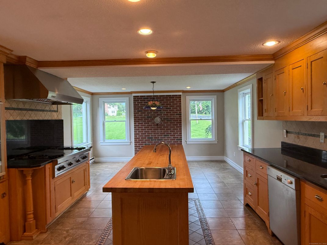 Interior, Kitchen, Recessed Lighting, Stainless Steel Appliances, Stone Walls