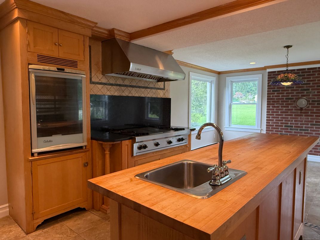 Interior, Kitchen, Pendant Lights, Recessed Lighting, Stainless Steel Appliances, Stone Walls