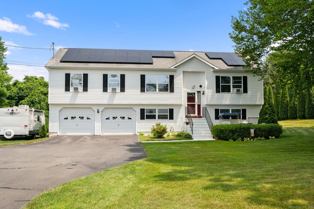 Attached, Exterior, Facade, Solar Panels, Raised Ranch