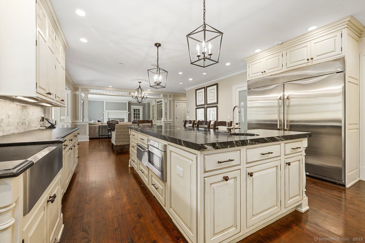 Chandelier, Interior, Kitchen, Pendant Lights, Recessed Lighting, Stainless Steel Appliances, Wood Texture Flooring