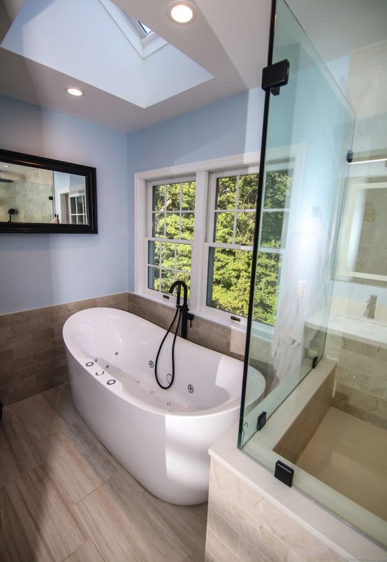 Bathroom, Free Standing Baths, Glass Shower, Interior, Recessed Lighting, Wood Texture Flooring