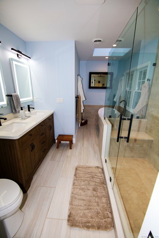 Bathroom, Dual Sink Vanities, Glass Shower, Interior, Recessed Lighting, Wood Texture Flooring