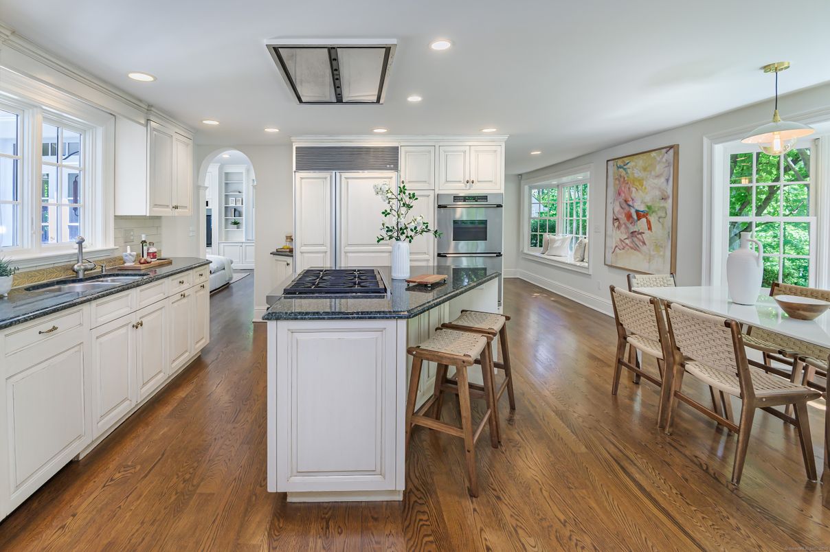 Dining room, Interior, Kitchen, Pendant Lights, Recessed Lighting, Stainless Steel Appliances, Wood Texture Flooring
