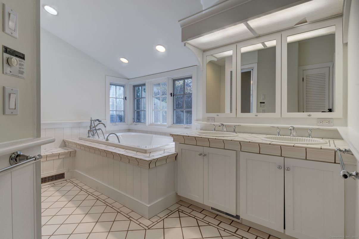 Bathroom, Dual Sink Vanities, Interior, Recessed Lighting, Tile Countertops