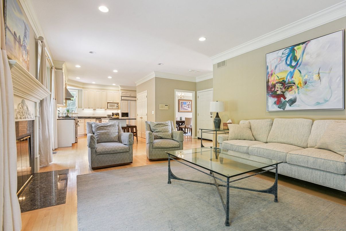 Fireplace, Interior, Kitchen, Living room, Recessed Lighting, Stainless Steel Appliances, Wood Texture Flooring