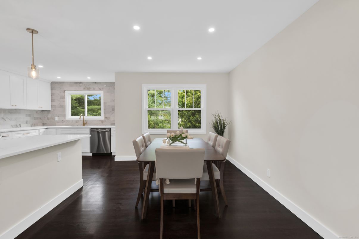 Dining room, Interior, Kitchen, Pendant Lights, Recessed Lighting, Stainless Steel Appliances, Wood Texture Flooring