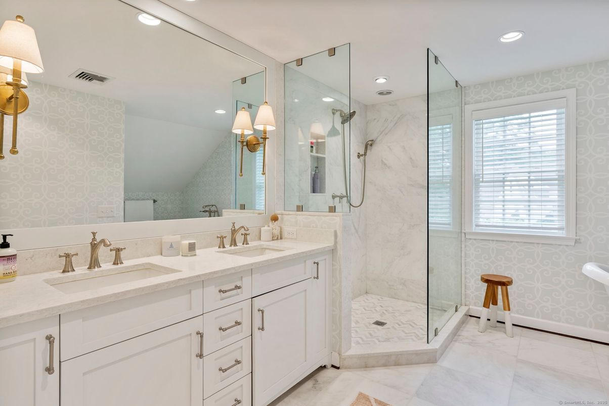 Bathroom, Dual Sink Vanities, Glass Shower, Interior, Marble, Marble Walls, Recessed Lighting