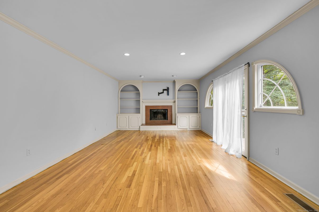 Empty room, Fireplace, Interior, Recessed Lighting, Wood Texture Flooring