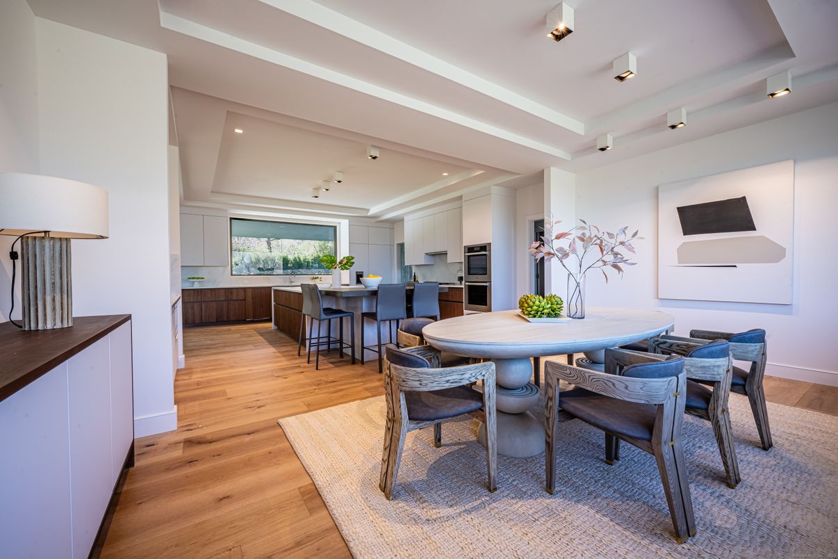 Dining room, Interior, Kitchen, Recessed Lighting, Stainless Steel Appliances, Wood Texture Flooring