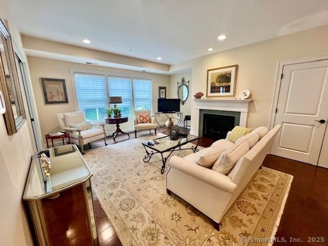 Fireplace, Interior, Living room, Recessed Lighting, Water, Wood Texture Flooring