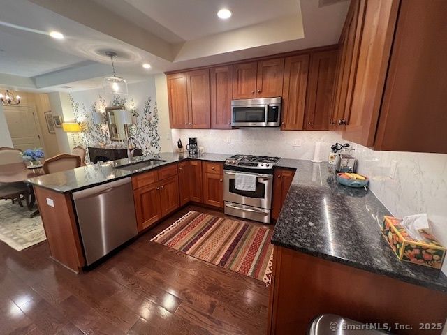 Chandelier, Dining room, Interior, Kitchen, Pendant Lights, Recessed Lighting, Stainless Steel Appliances, Wood Texture Flooring