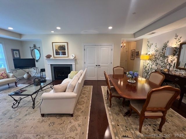 Dining room, Fireplace, Interior, Living room, Recessed Lighting, Wood Texture Flooring