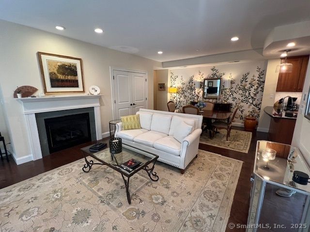 Fireplace, Interior, Living room, Piano, Recessed Lighting, Wood Texture Flooring