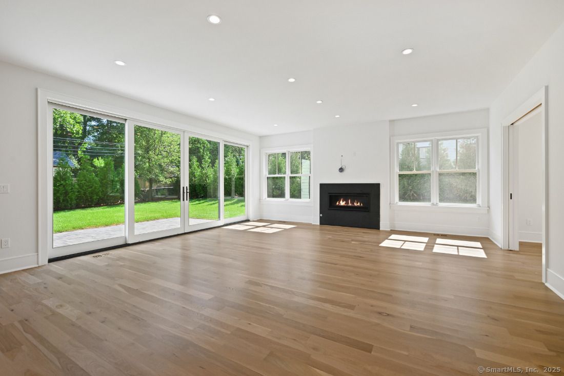 Empty room, Fireplace, Interior, Recessed Lighting, Wood Texture Flooring