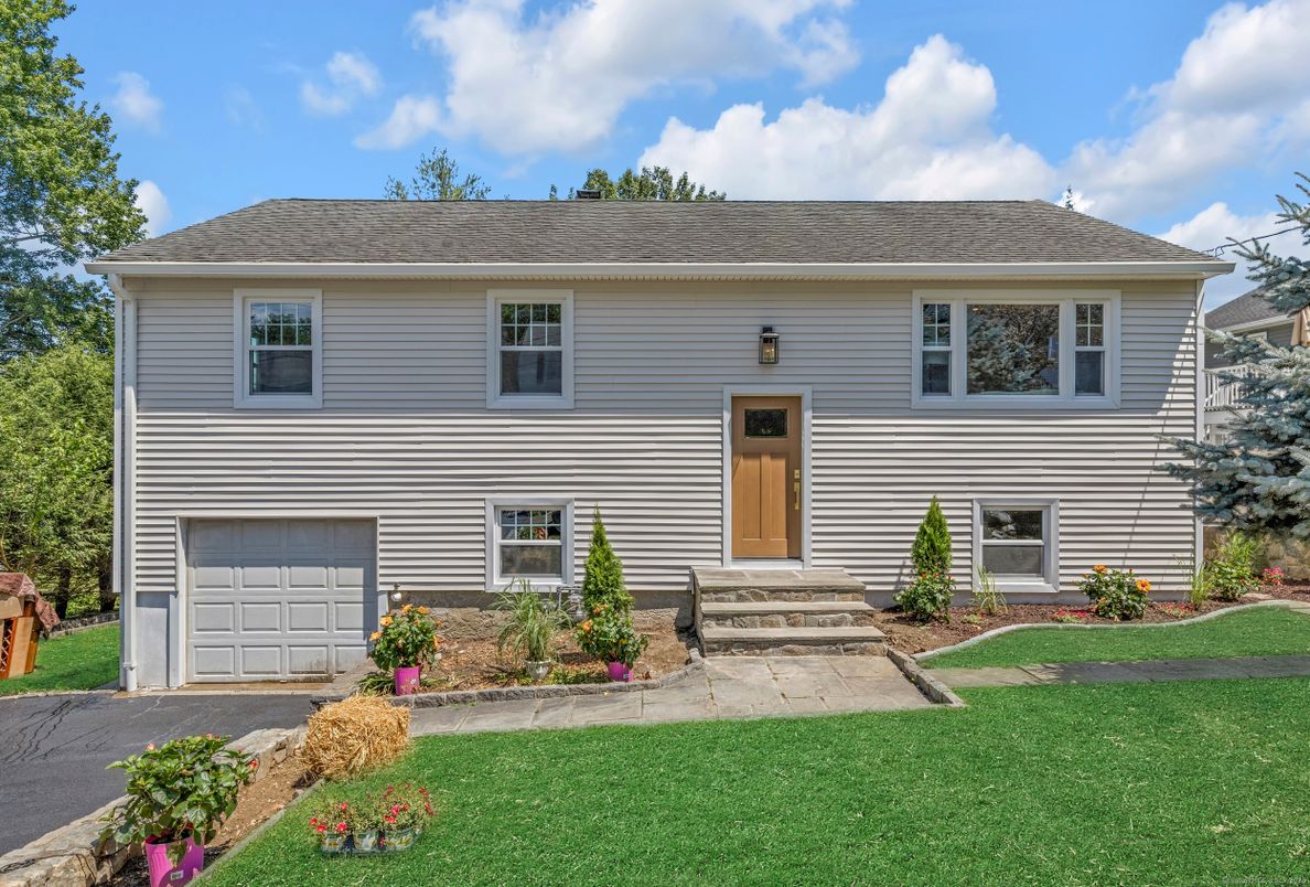 Attached, Exterior, Facade, Raised Ranch
