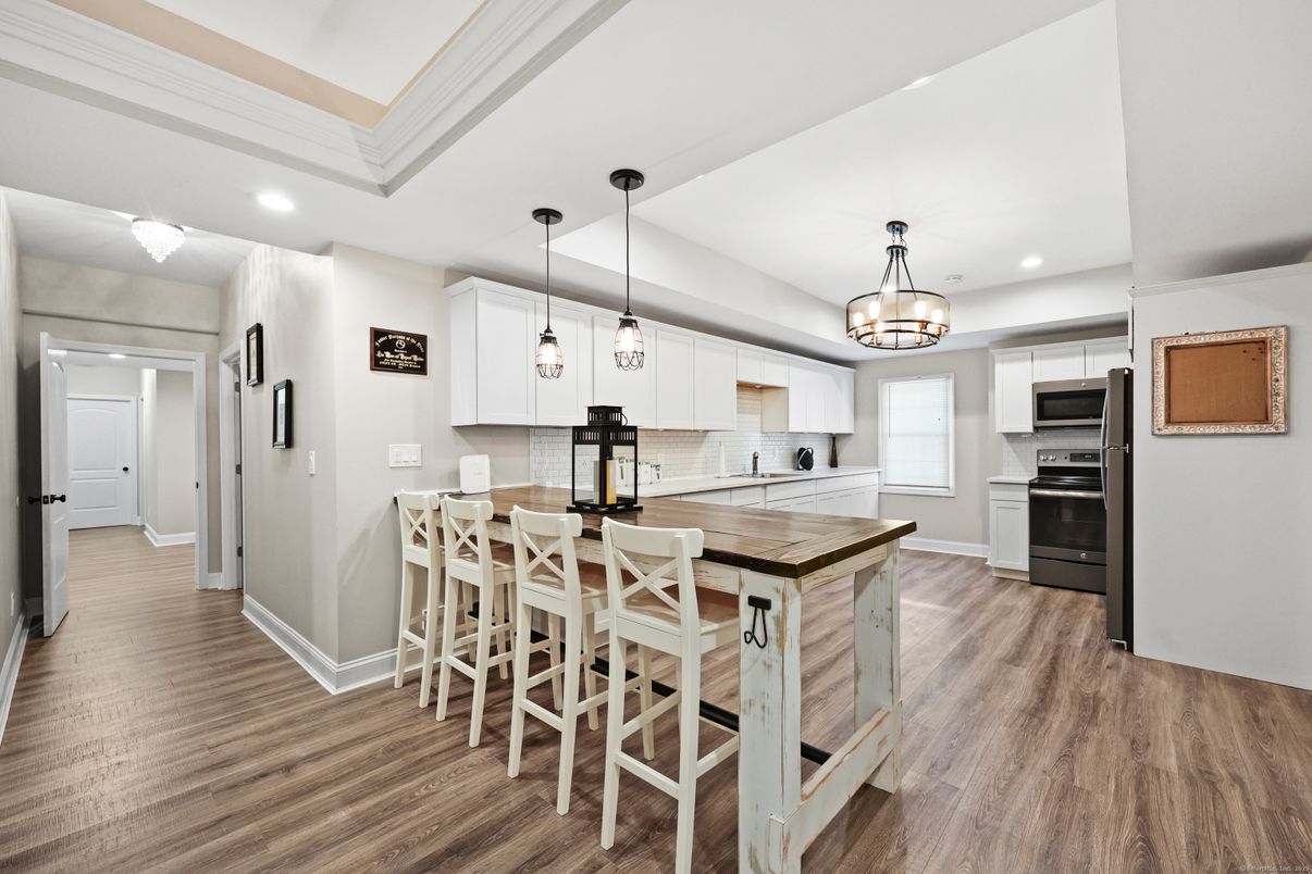 Interior, Kitchen, Pendant Lights, Recessed Lighting, Stainless Steel Appliances, Wood Texture Flooring