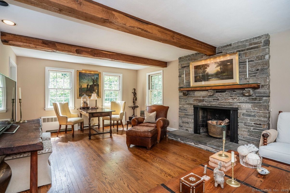 Dining room, Fireplace, Interior, Living room, Recessed Lighting, Stone Walls, Wooden Beams, Wood Texture Flooring