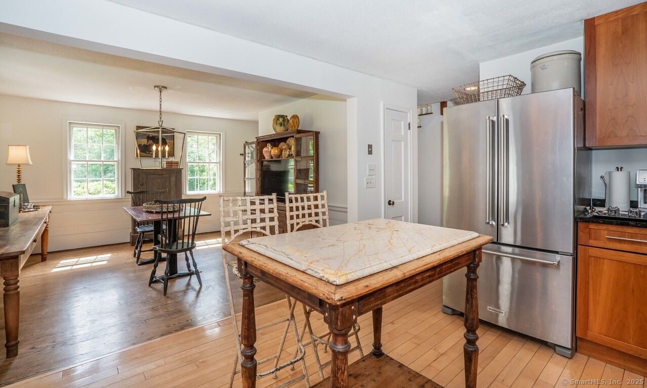 Dining room, Interior, Kitchen, Pendant Lights, Stainless Steel Appliances, Wood Texture Flooring